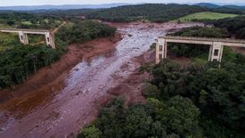 A bridge destroyed by floodwaters.