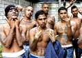 TMP Papers – Prisoners holding gang signs (2010).jpg